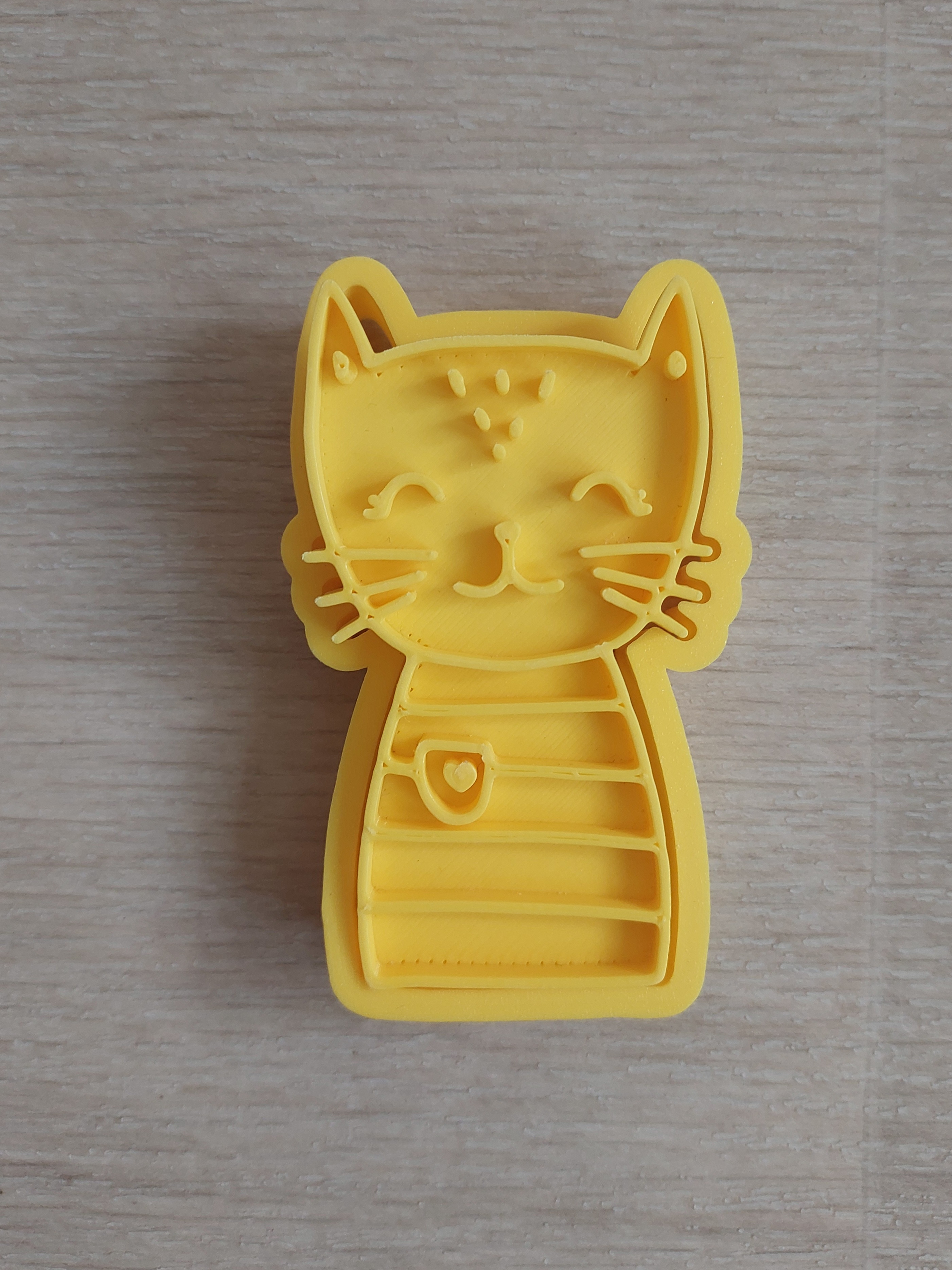 Kočka V. - Razítko a vykrajovátko